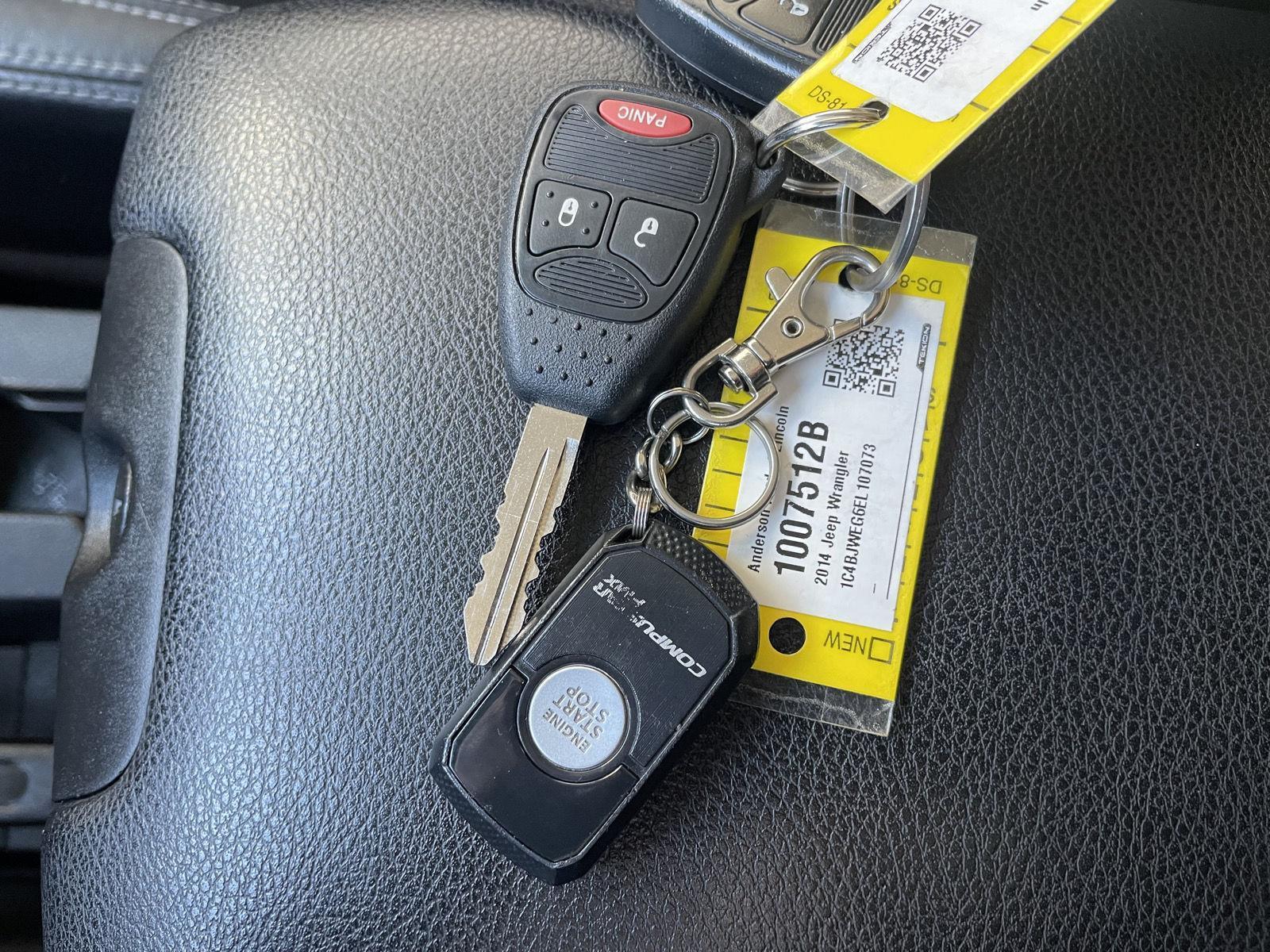 Pre-Owned 2014 Jeep Wrangler Unlimited for sale in Lincoln NE