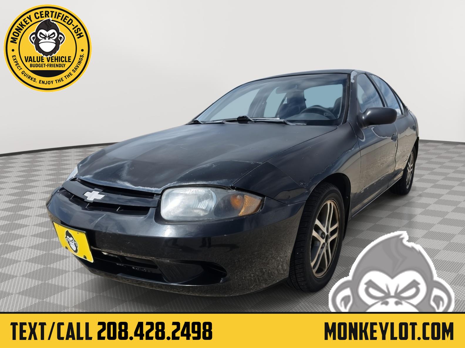 Black 2004 Chevrolet Cavalier Sedan Front-Wheel Drive 4-Speed Automatic Overdrive