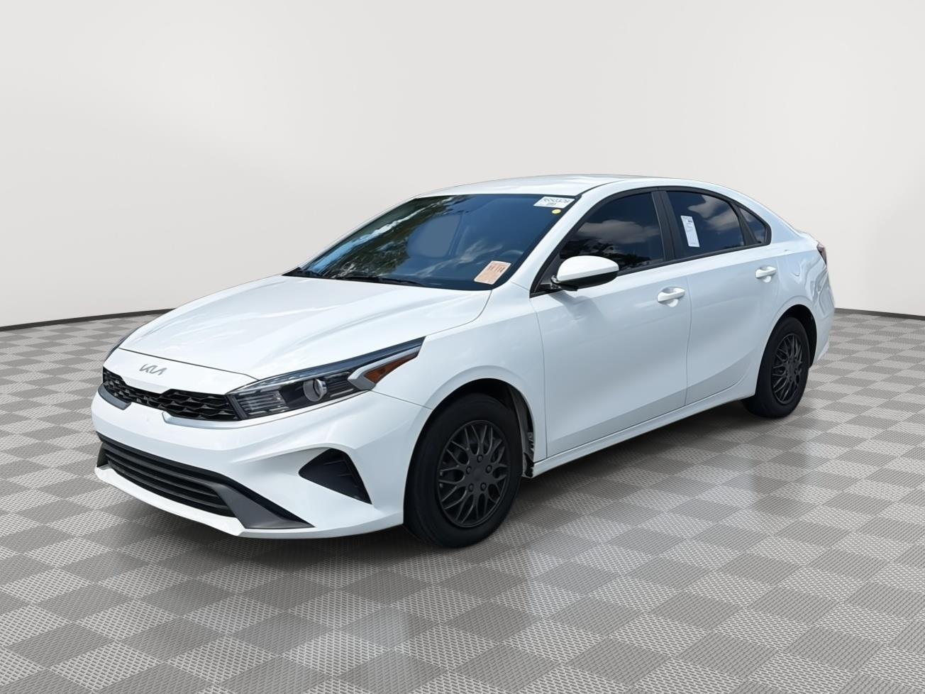 Clear White 2024 Kia Forte Sedan Front-Wheel Drive Continuously Variable Transmission