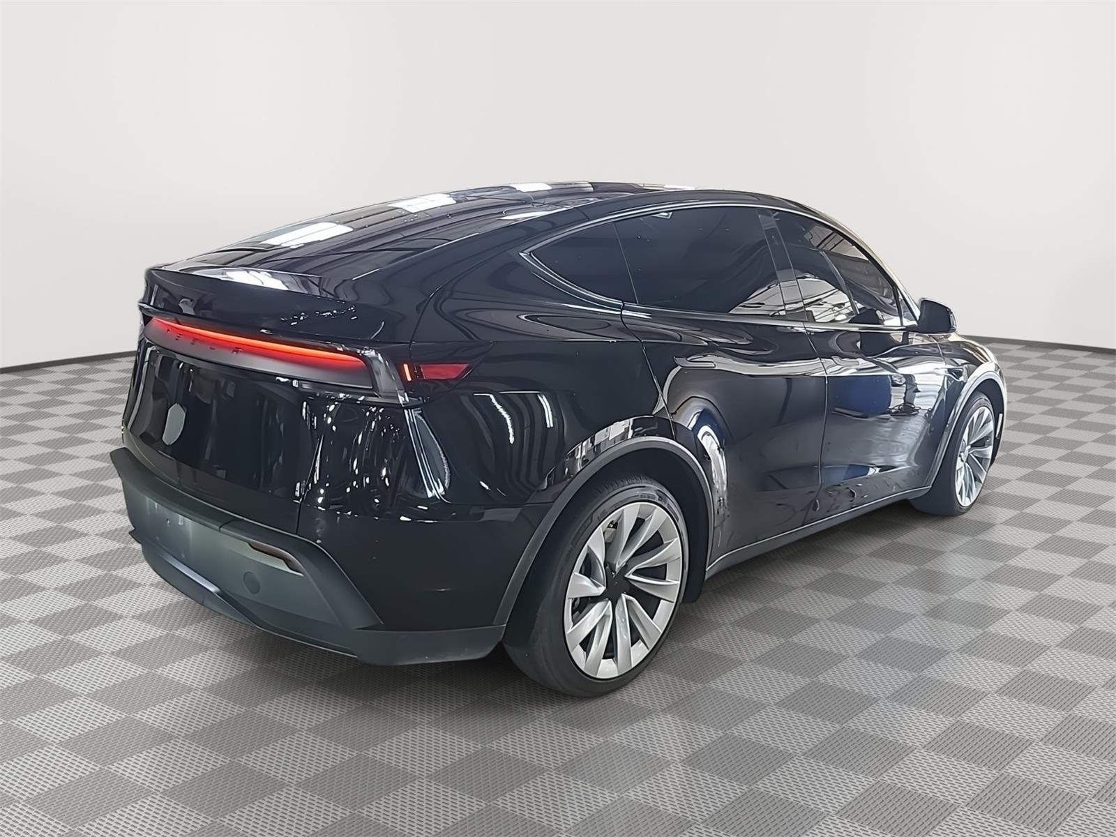 Used 2026 Tesla Model Y Premium with VIN 7SAYGDED0TA618068 for sale in New Port Richey, FL