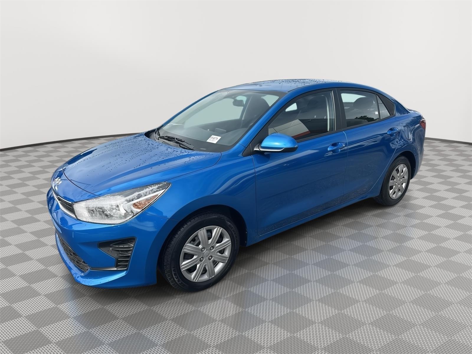 Sporty Blue 2023 Kia Rio S FWD Sedan Front-Wheel Drive Continuously Variable Transmission