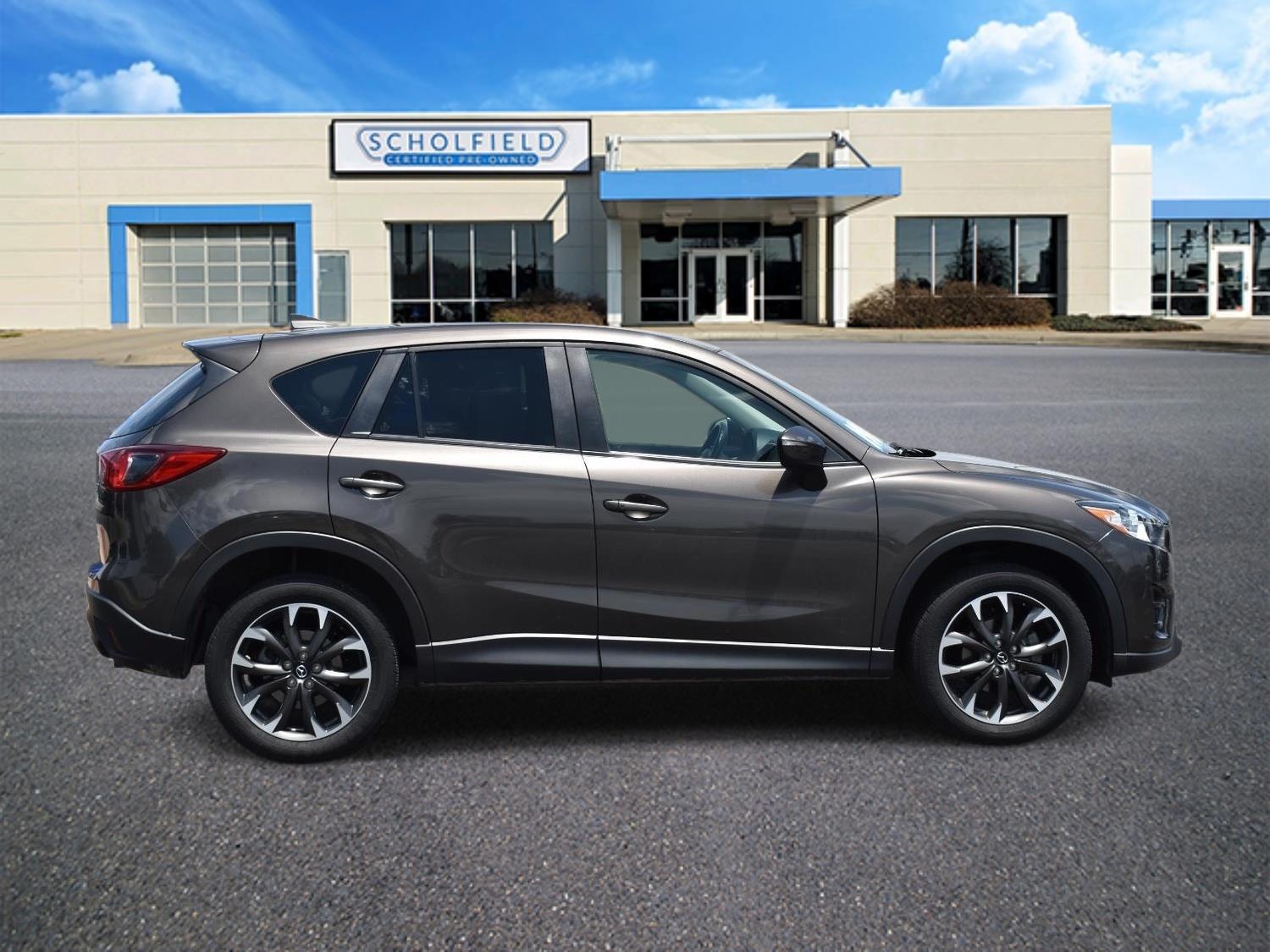 Used 2016 Mazda CX-5 Grand Touring with VIN JM3KE2DY0G0860312 for sale in Wichita, KS