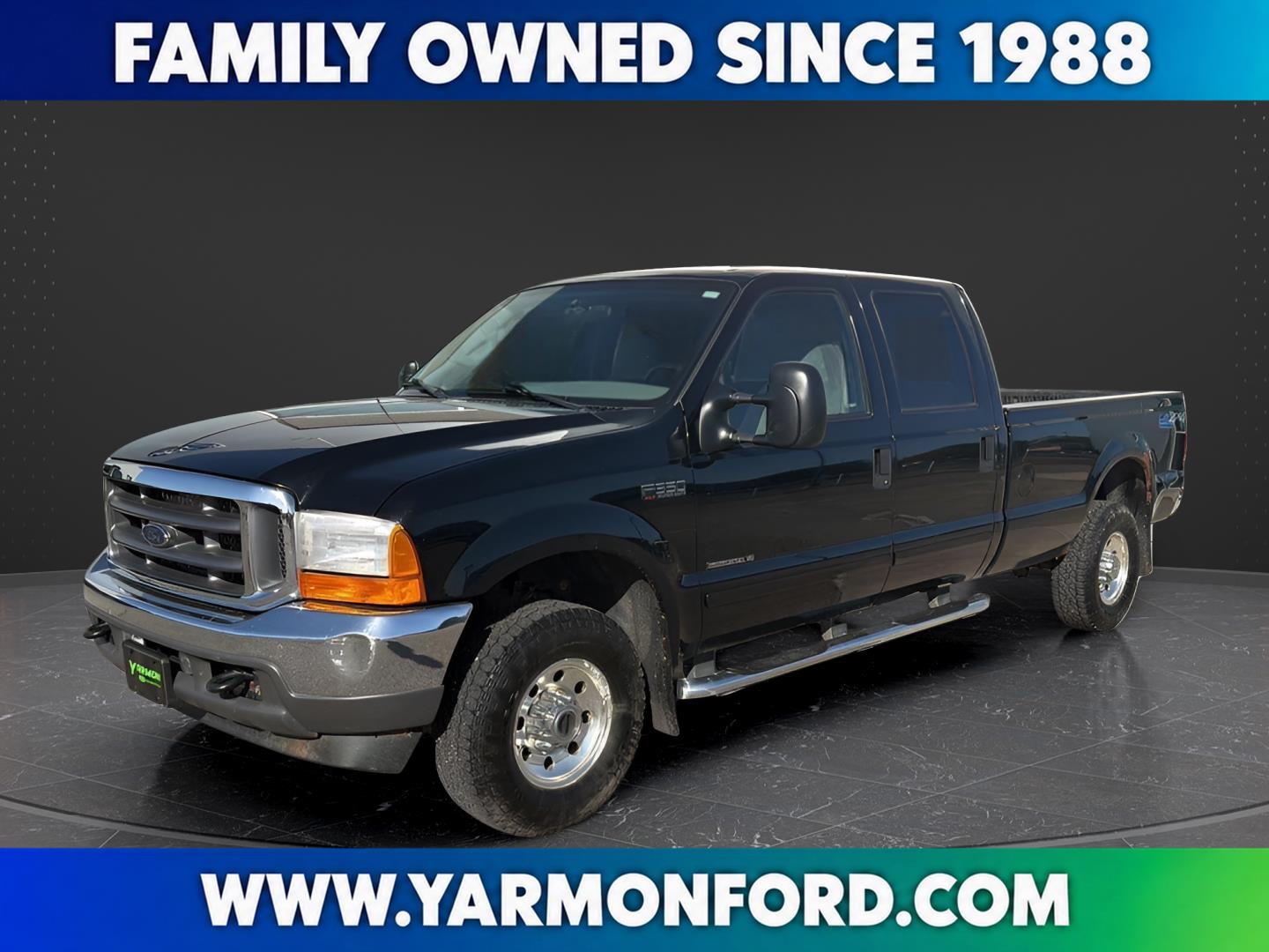 Black 2001 Ford F-350 Super Duty Pickup Truck Four-Wheel Drive 4-Speed Automatic
