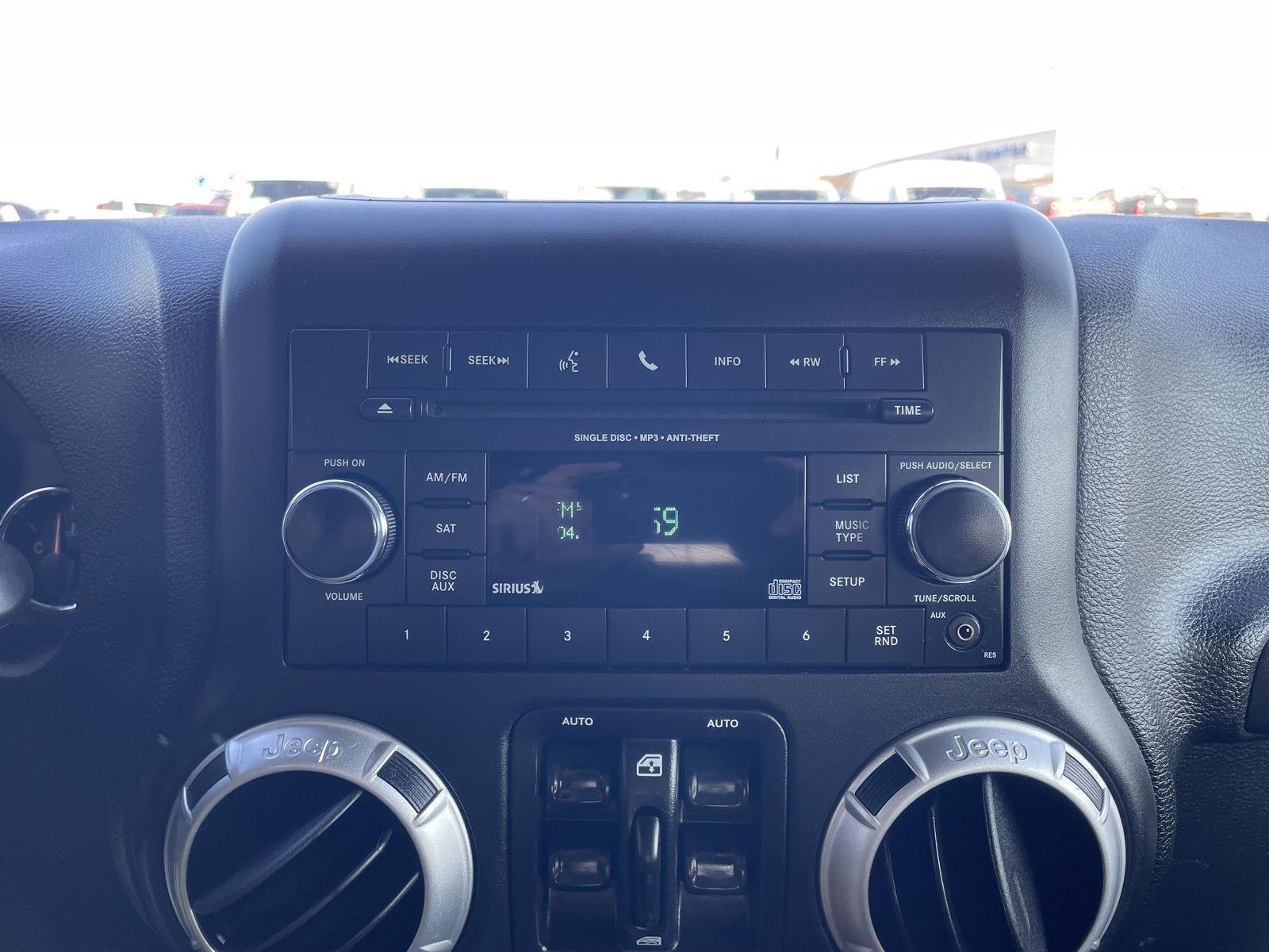 Pre-Owned 2015 Jeep Wrangler Unlimited for sale in Lincoln NE