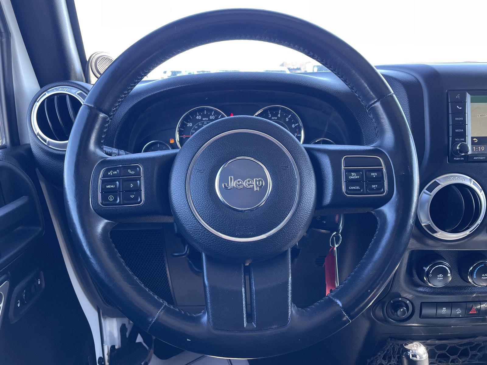 Pre-Owned 2013 Jeep Wrangler Unlimited for sale in Lincoln NE