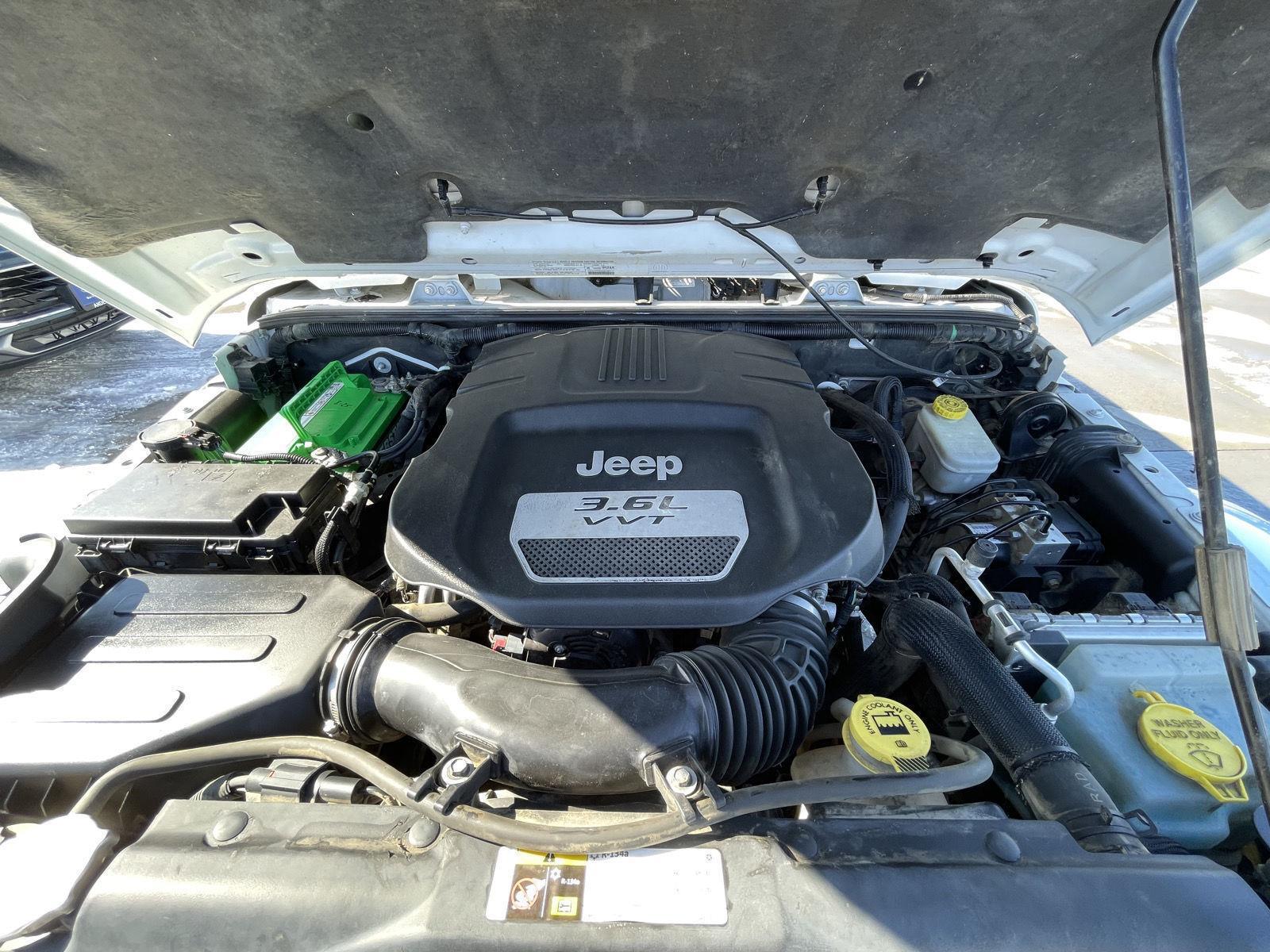 Pre-Owned 2013 Jeep Wrangler Unlimited for sale in Lincoln NE