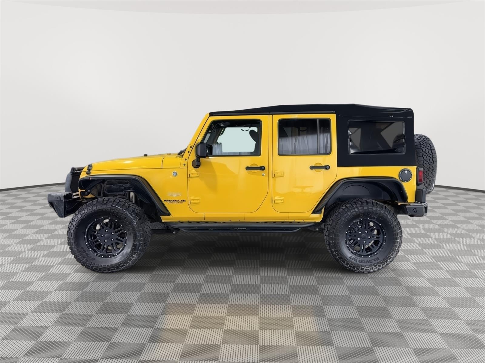 Used 2015 Jeep Wrangler Unlimited Sahara with VIN 1C4BJWEG8FL552061 for sale in Kansas City