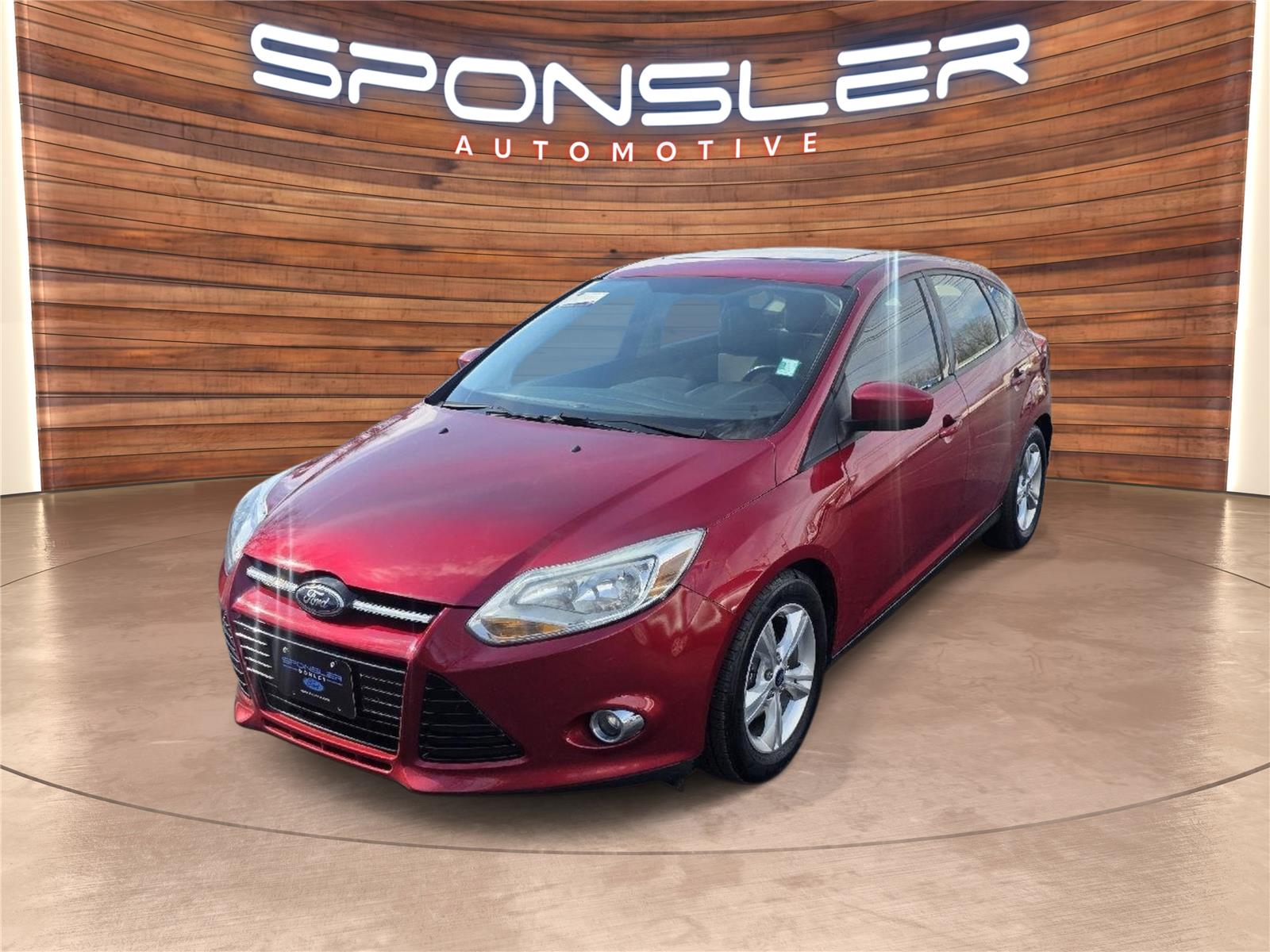Red Candy Metallic Tinted Clearcoat 2012 Ford Focus Hatchback Front-Wheel Drive 6-Speed Automatic