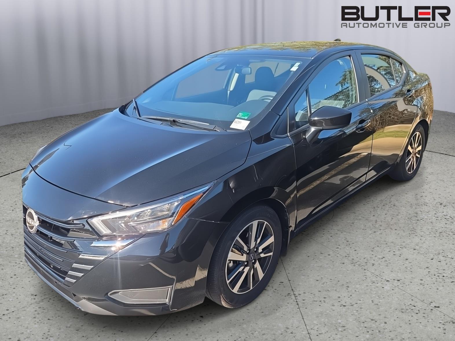 Black 2025 Nissan Versa Sedan Front-Wheel Drive 