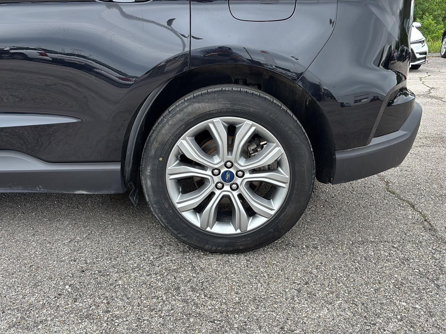 View vehicle photo 7