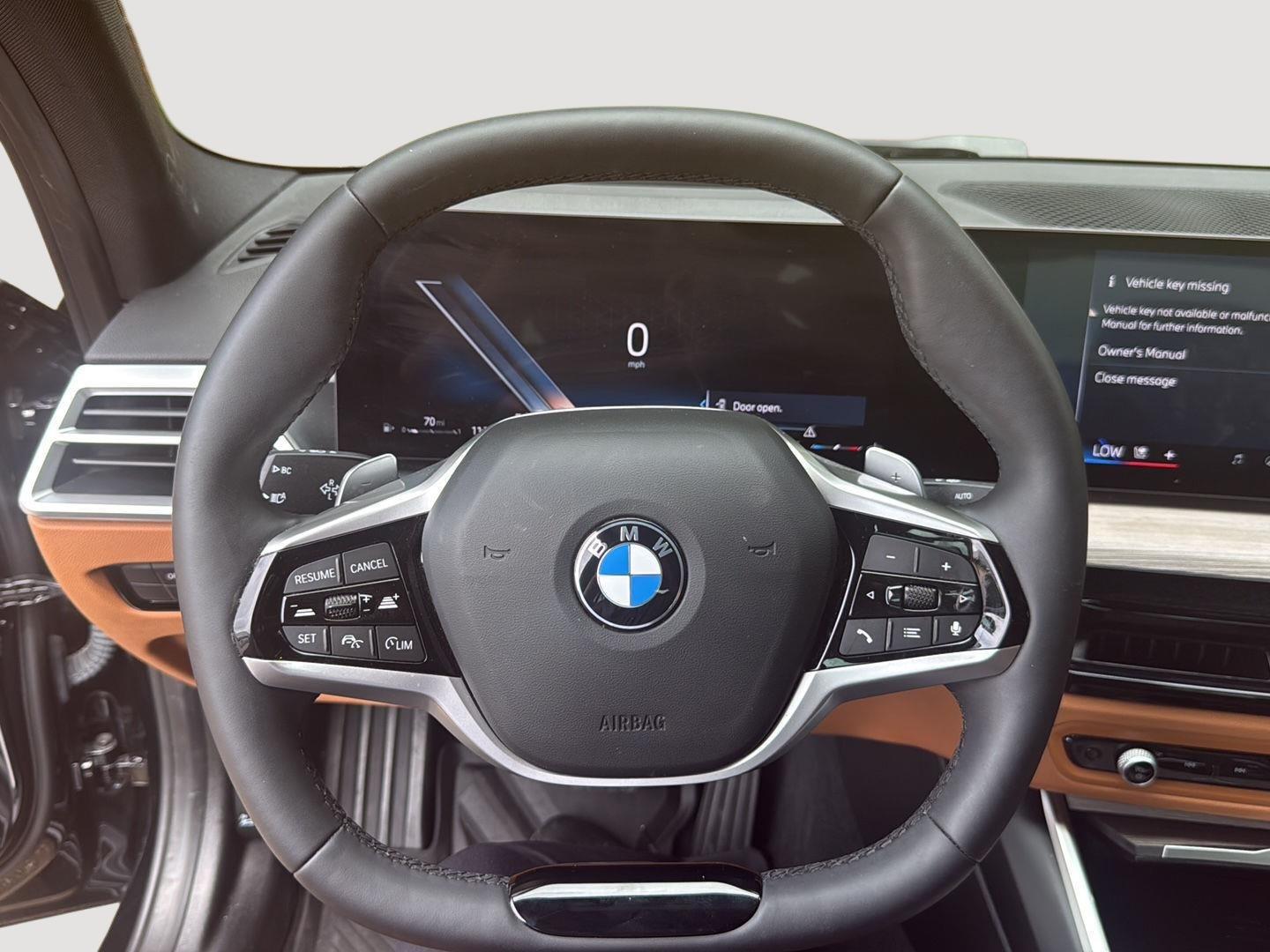 2025 BMW 3 Series 330i - Black Sapphire Metallic exterior view 6