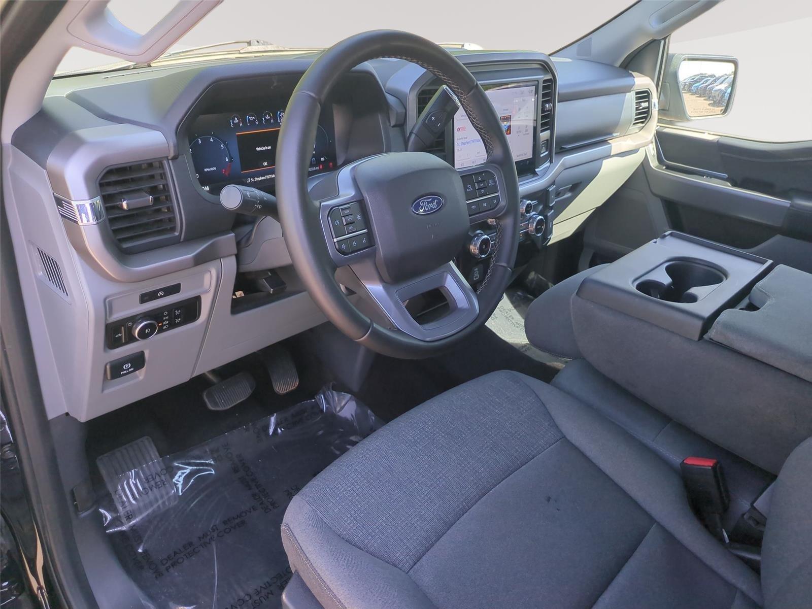 2025 Ford F-150 XLT - Agate Black exterior view 2
