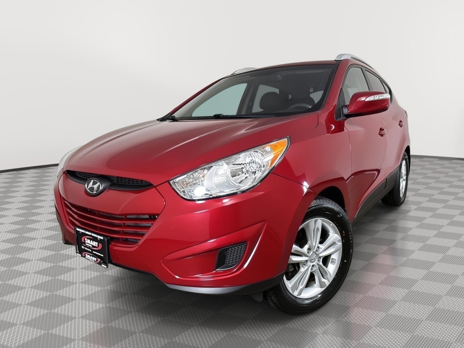 Garnet Red 2012 Hyundai Tucson SUV / Crossover Front-Wheel Drive Automatic