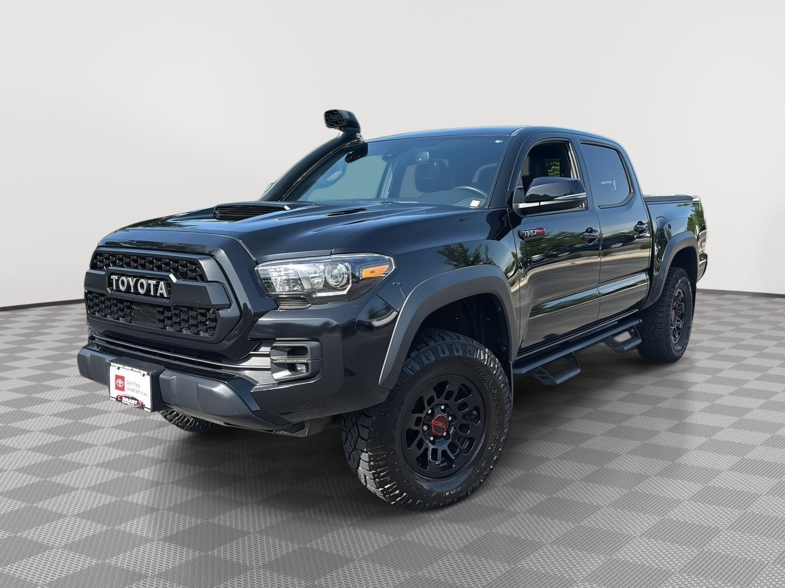 Midnight Black Metallic 2019 Toyota Tacoma Pickup Truck Four-Wheel Drive Automatic
